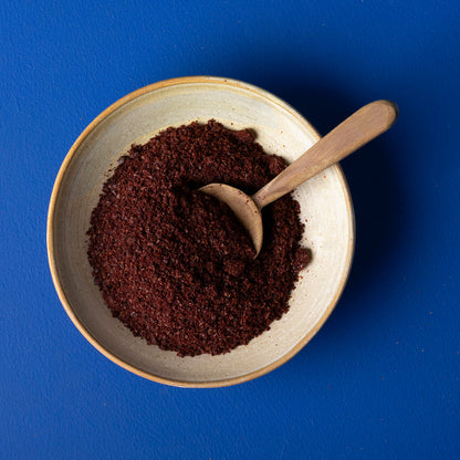 Dried wild elephant sumac spice in a 100g package, showcasing reddish-brown dried herb from Whole Food Earth.