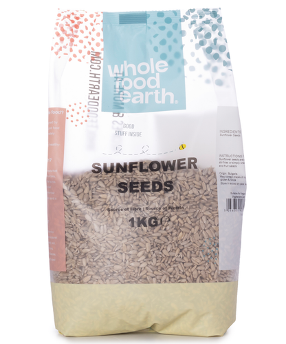 Whole Food Earth sunflower seeds, 1kg package, close-up of raw sunflower seeds in a bowl, nuts and seeds product.