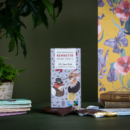 Bennetto Natural Foods UK 82% super dark chocolate bar showing rich, glossy dark chocolate surface with textured edges.