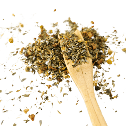 Loose leaf Sweet Dreams fruit and herbal tea by Porter Hill Tea Company, displayed in a clear tea jar with fresh herbs and dried fruit.