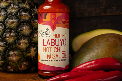 Filipino Style Labuyo Hot Chilli Sauce by RoniBs Kitchen, tropical fire hot sauce with vibrant red chili peppers in a glass bottle