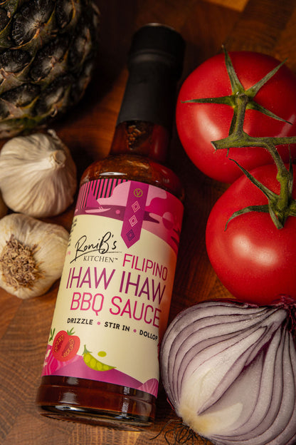 Filipino Style Ihaw Ihaw BBQ sauce by RoniBs Kitchen, a flavorful marinade for grilling, shown in a bottle with vibrant label.