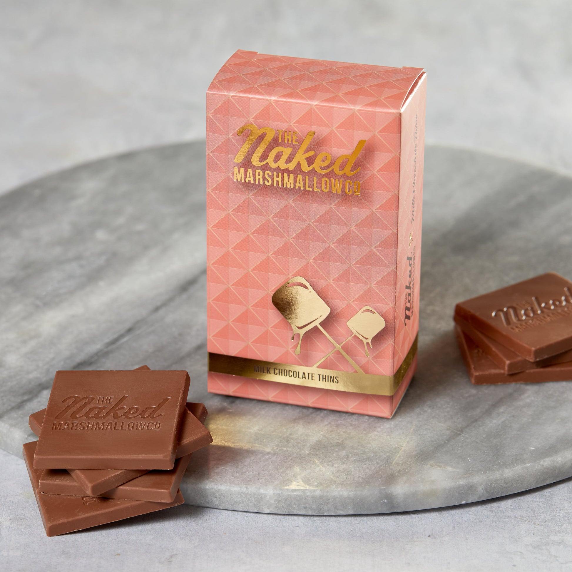Milk Chocolate Thins by THE MARSHMALLOW FACTORY, featuring crispy milk chocolate-coated marshmallow pieces.