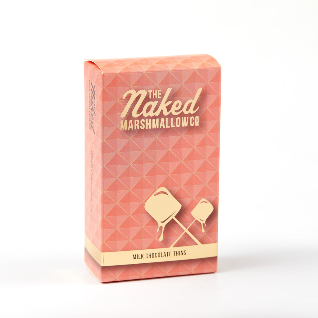 Naked marshmallow topped with milk chocolate thins from THE MARSHMALLOW FACTORY, showcasing a close-up of the sweet treat.