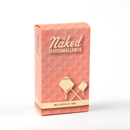 Naked marshmallow topped with milk chocolate thins from THE MARSHMALLOW FACTORY, showcasing a close-up of the sweet treat.