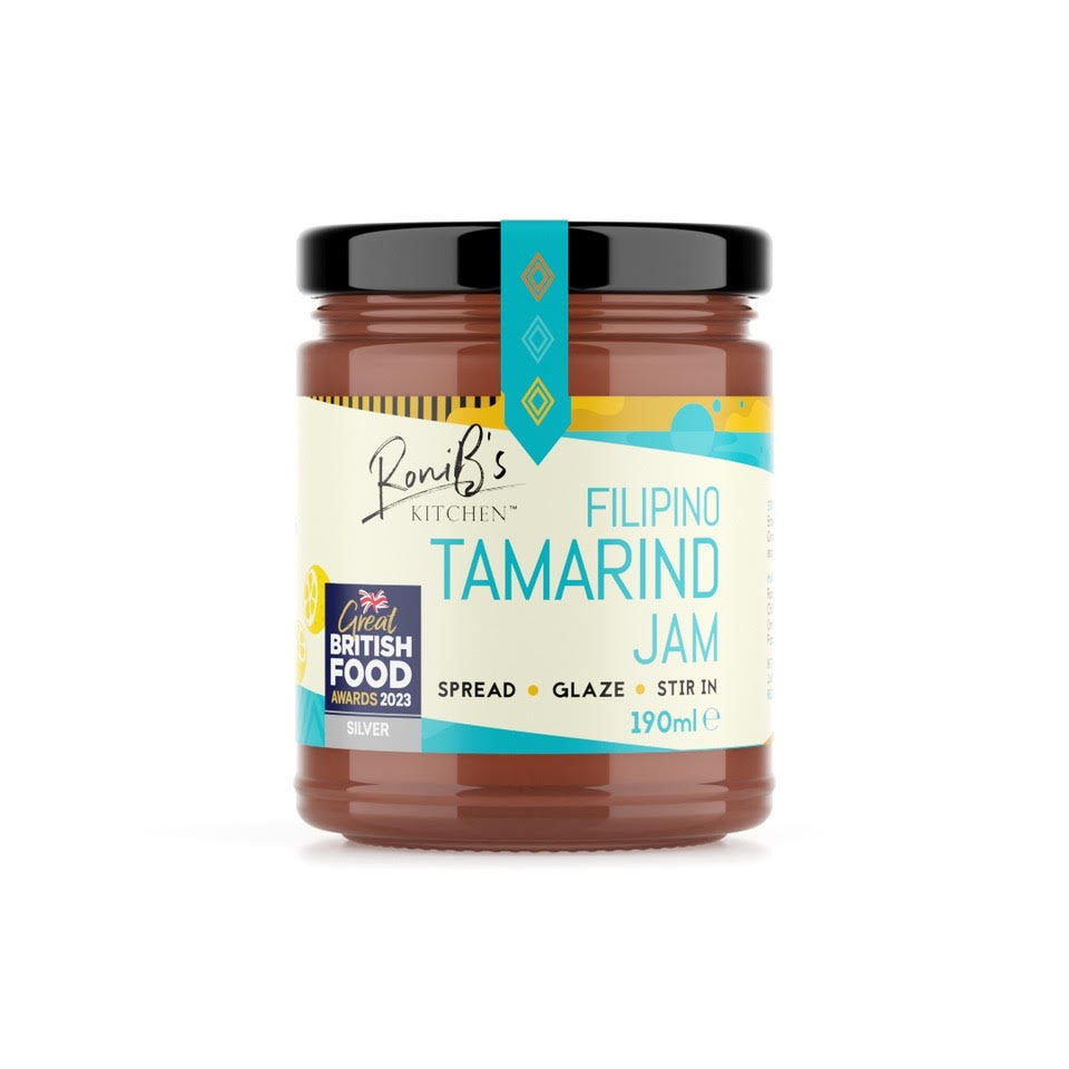 RoniBs Kitchen Filipino tamarind jam with Tarsier Gin, award-winning jam ideal for cheese pairing, in a jar with label visible.