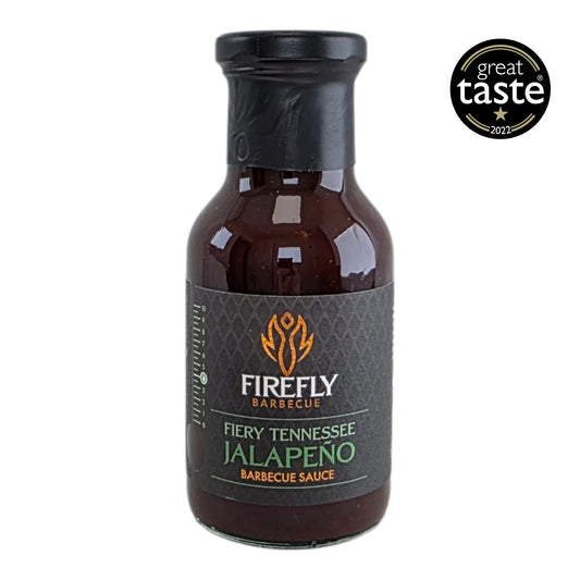 FireFly Barbecue Tennessee Jalapeño BBQ Sauce in a bottle, showcasing the spicy, tangy sauce with a vibrant label.