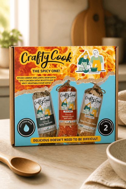 Packaging of Crafty Cook The Spicy One gluten-free 3-pack of 2-serving meals with vibrant spicy flavor branding.