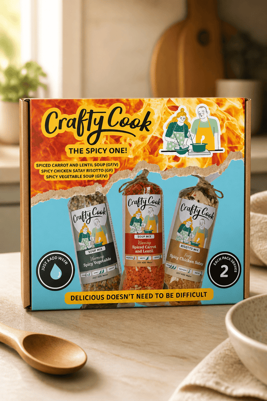 Packaging of Crafty Cook The Spicy One gluten-free 3-pack of 2-serving meals with vibrant spicy flavor branding.