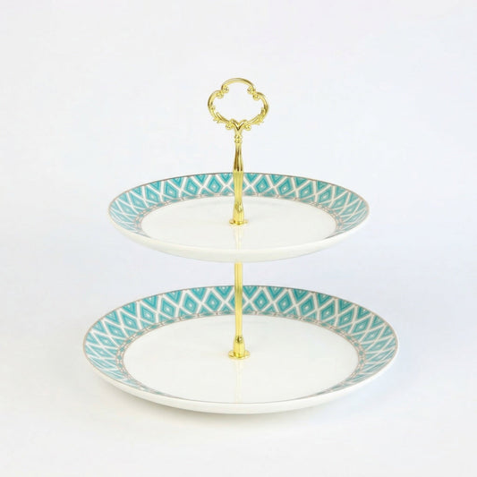 Elegant Edwardian Bone China Cake Stand by KitchBoom with intricate detailing and a classic white finish.