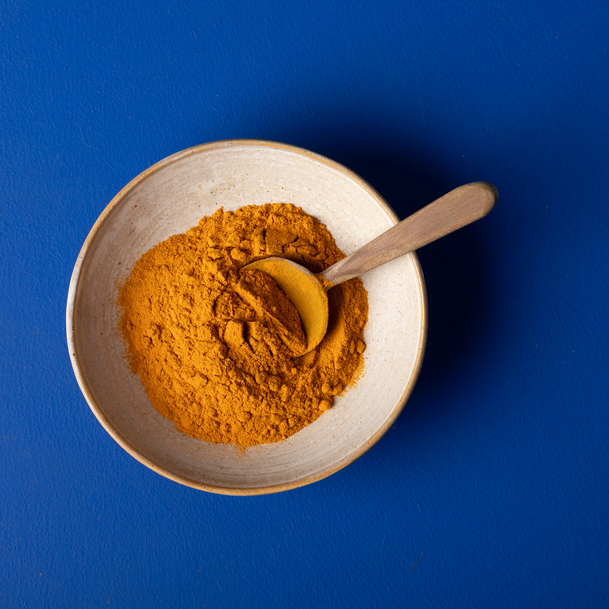Organic wild elephant turmeric powder in 150g package, a vibrant yellow herbs and spices used in cooking and health remedies.