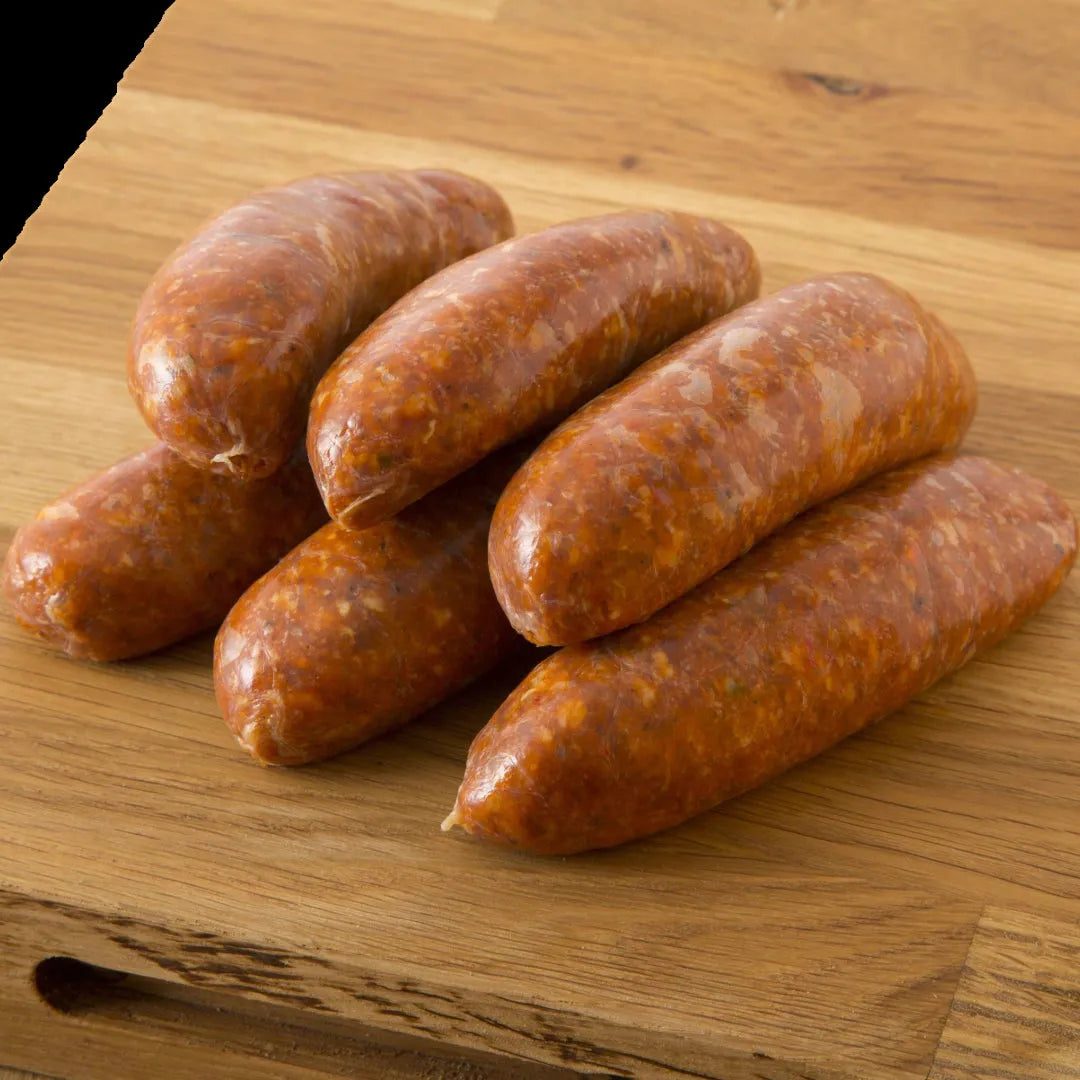 Primrose Herd chorizo sausages showcasing their fresh, seasoned sausages with a rich red color and natural casing.