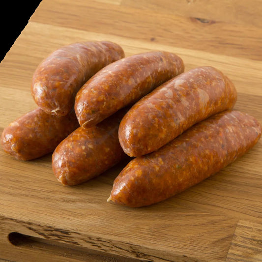 Primrose Herd chorizo sausages showcasing their fresh, seasoned sausages with a rich red color and natural casing.