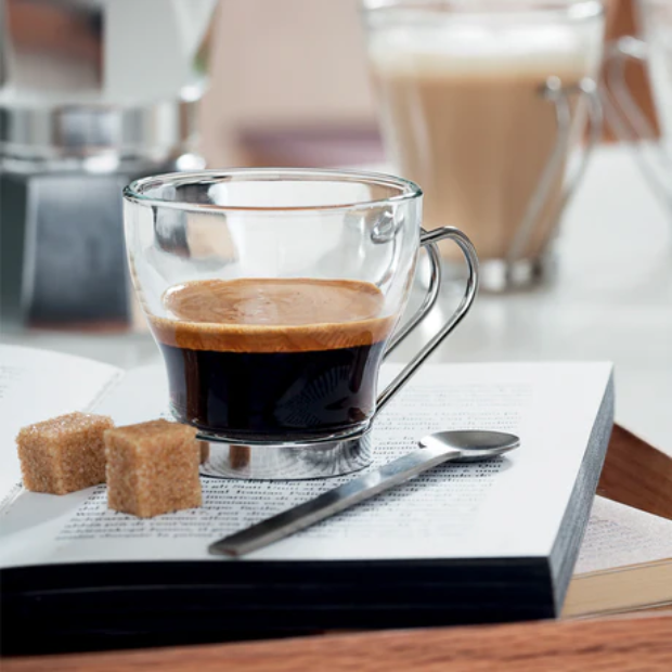 Set of six Bormioli Rocco 100ml punch glasses, stylish coffee glasses with clear glass design for serving drinks.