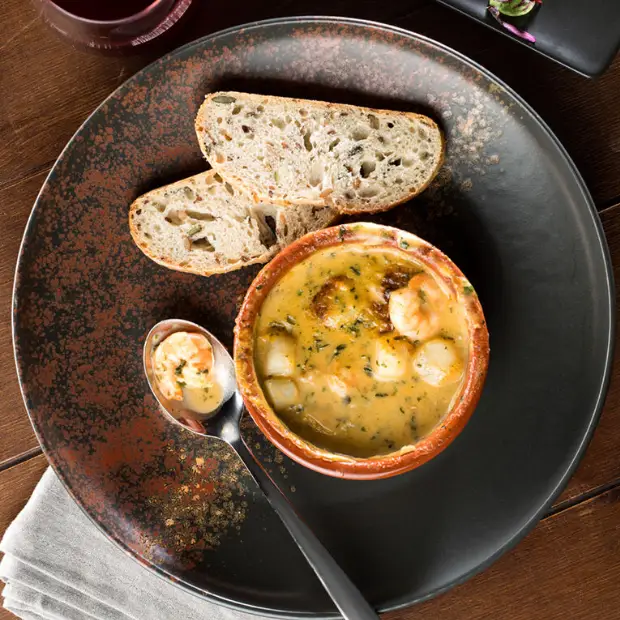 Glassware UK 21cm Oxy Coupe Plate showing a sleek, clear glass plate with a smooth, rounded edge and elegant design.