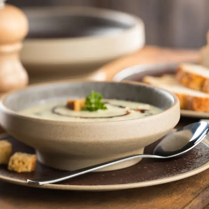 Glassware UK 11.25-inch truffle plate with a smooth glass surface and elegant round shape, ideal for serving small treats.