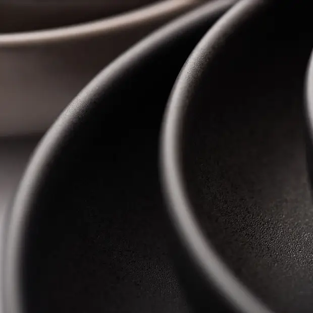 Black coupe plate by Glassware UK, 7-inch (17.5cm) round ceramic plate with a sleek matte finish and modern design.