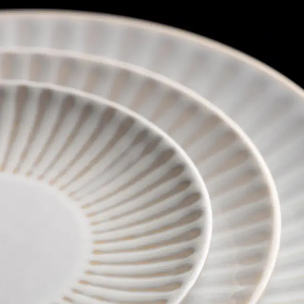 Venus Coupe Plate 6.5-inch glass plate by Glassware UK, showcasing a sleek, clear design with a smooth rim and elegant shape.