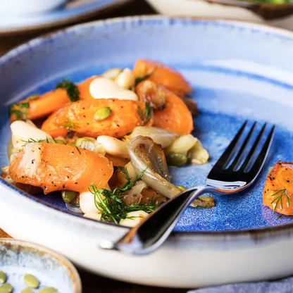 12-inch Murra Pacific Coupe Plate by Glassware UK, showcasing a sleek, modern design with a smooth, curved edge.