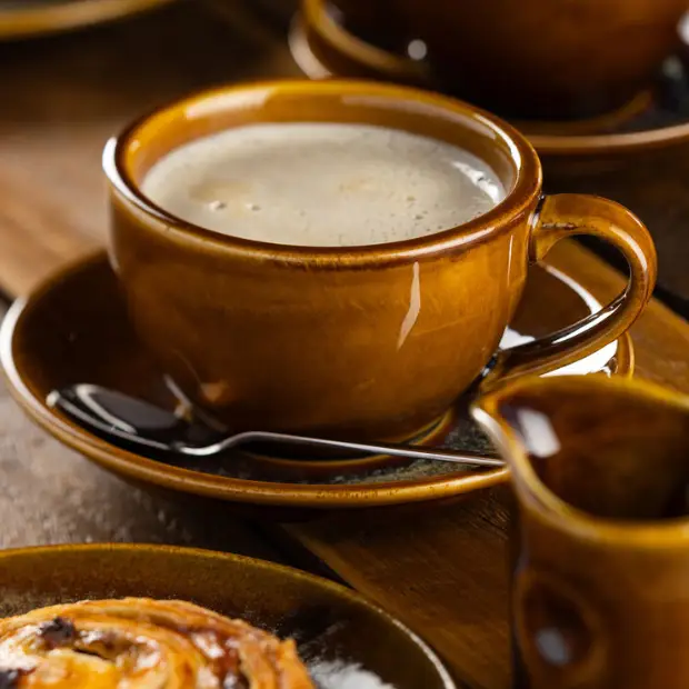 Murra Toffee Conical Bowl from Glassware UK, 7.5-inch (19.5cm) ceramic bowl with a glossy toffee finish and smooth conical shape.