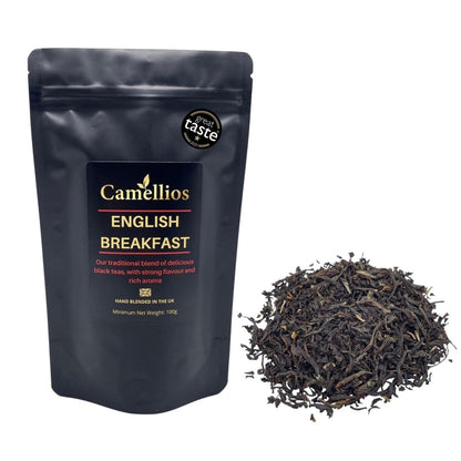 Loose leaf English Breakfast tea from Camellios with golden-brown tea leaves and a traditional tea blend in a clear glass jar