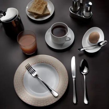 Stainless steel Pintinox Stresa tea spoon from Glassware UK, with a sleek handle and polished finish, on a white background.