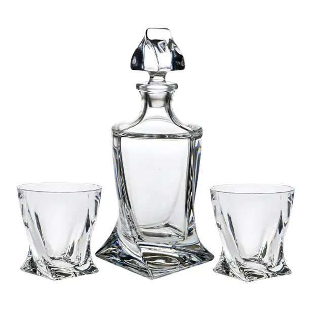 Crystalite 3-piece whisky decanter set from Glassware UK, featuring elegant glass bottles with stoppers and matching glasses.