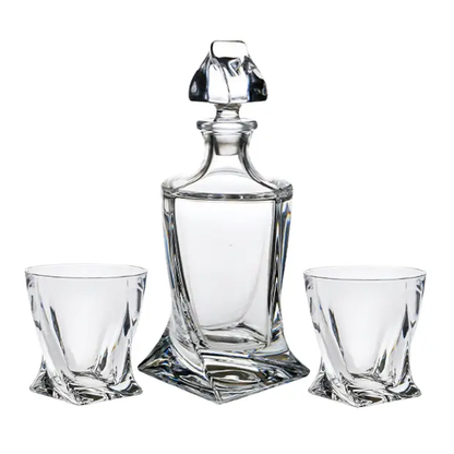 Crystalite 3-piece whisky decanter set from Glassware UK, featuring elegant glass bottles with stoppers and matching glasses.