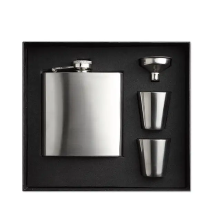 Glassware UK hip flask gift set with stainless steel flask, cups, and accessories in a stylish gift box.