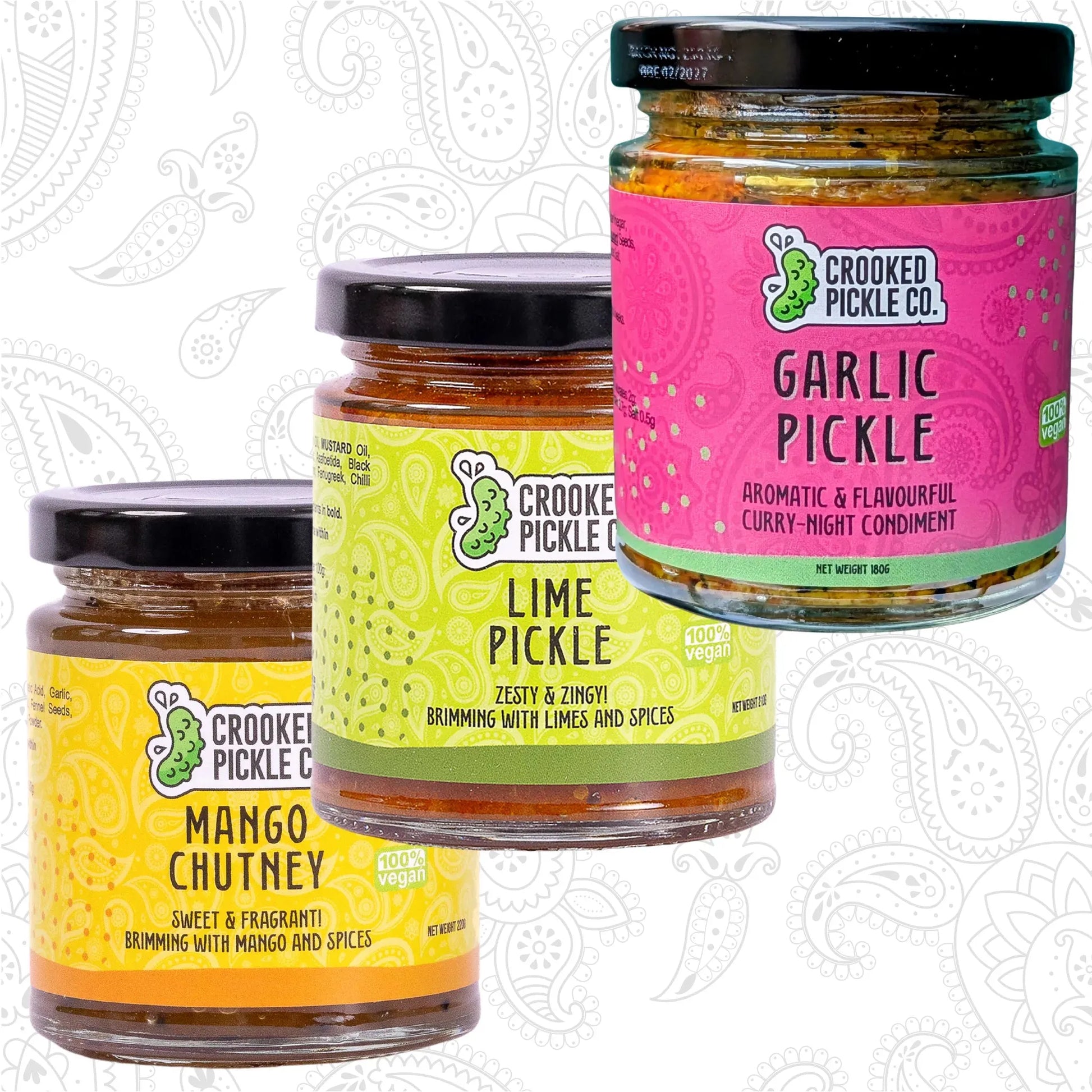 CROOKED PICKLE CO Curry Night Trio featuring three jars of assorted curry sauces with vibrant labels and fresh ingredients.