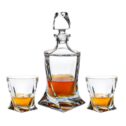 Crystalite 3-piece whisky decanter set by Glassware UK, includes three clear glass decanters with stoppers on a wooden tray.