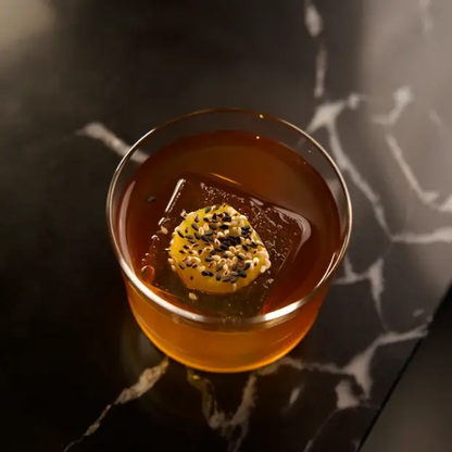 Set of six Bormioli Rocco Swirl mini whisky tumblers with clear glass and swirling design, perfect for serving spirits.
