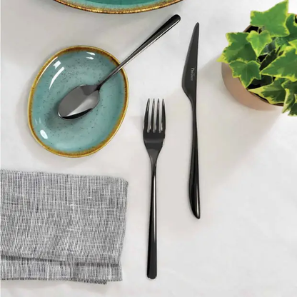 Glassware UK Pintinox Florence by Night 24-piece cutlery set with polished stainless steel forks, knives, spoons arranged on a white background.