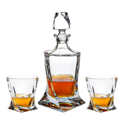 Crystalite 3-piece whisky decanter set by Glassware UK, featuring three glass decanters with elegant shapes for whisky storage and serving.