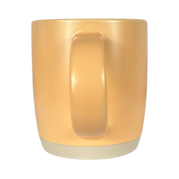 Ceramic peach-colored coffee mug from Glassware UK with a smooth finish, ideal for hot beverages and daily use.