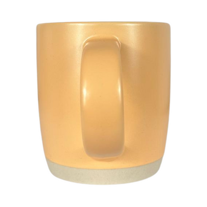 Ceramic peach-colored coffee mug from Glassware UK with a smooth finish, ideal for hot beverages and daily use.