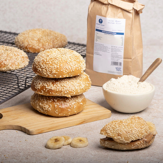 Vital wheat gluten flour from Whole Food Earth, showing a bag of Serious Grains gluten flour on a rustic kitchen countertop.