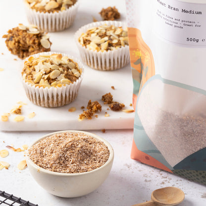 Whole Food Earth Wheat Bran Medium cereal in a bowl with a spoon, showcasing the healthy breakfast option.