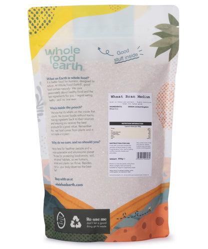 Medium wheat bran cereal from Whole Food Earth, showing a close-up of the light brown, textured wheat bran in a 500g package.