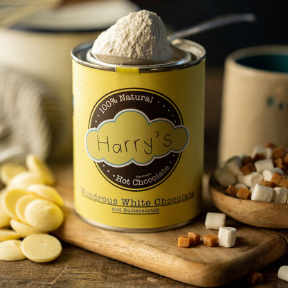 White Harry's Hot Chocolate tin with 30% hot chocolate powder, featuring a sleek white container and lifestyle background.
