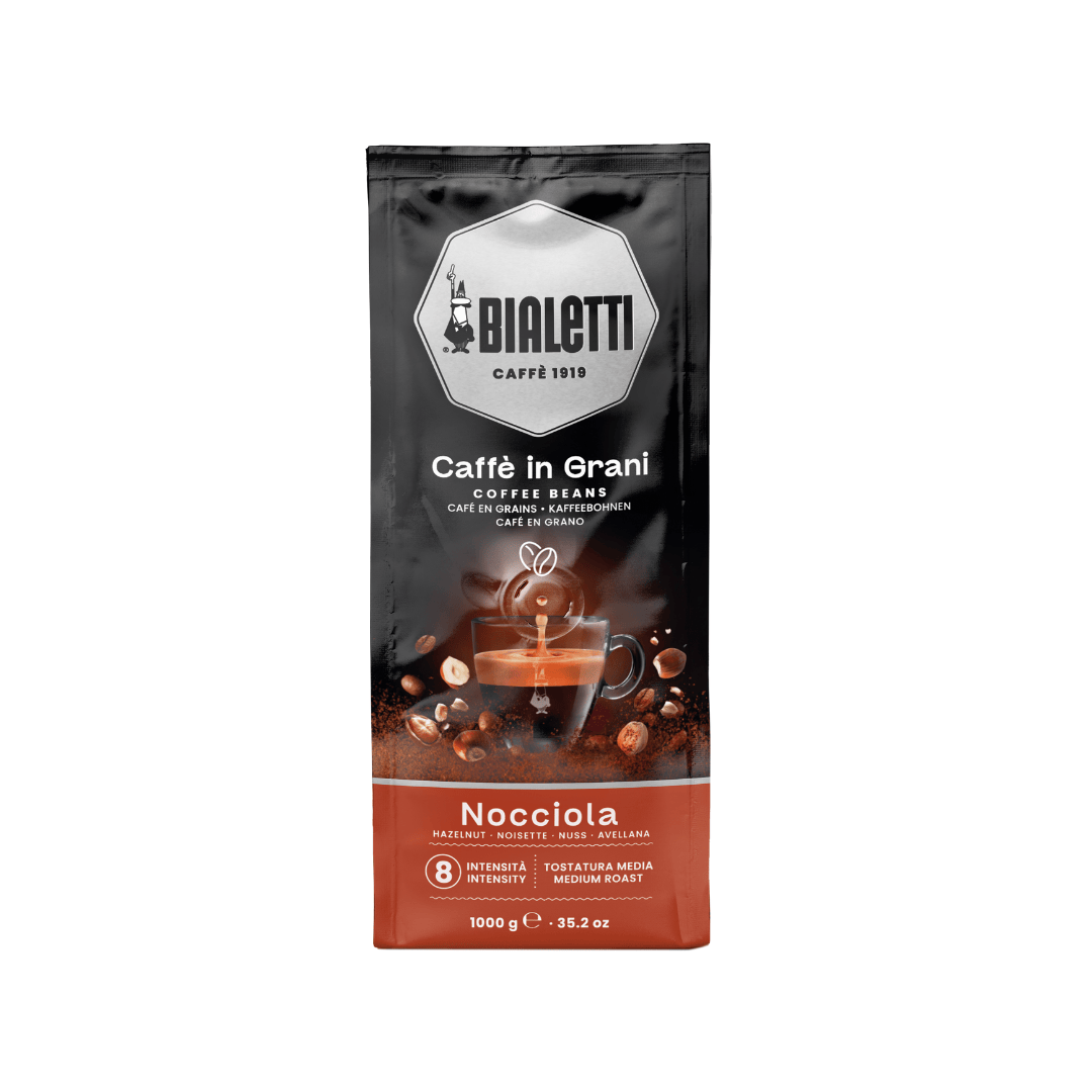 Bialetti Brew Italia whole bean coffee with hazelnut flavor in 1kg bag, showcasing coffee beans with a rich aroma.