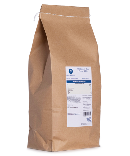 Wholemeal rye flour in a 1kg bag from Whole Food Earth, stoneground, showing the flour's texture and packaging for baking uses.
