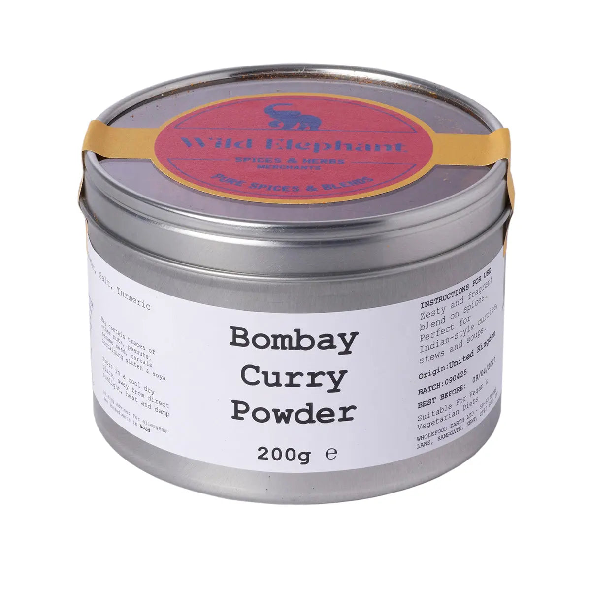 Wild Elephant Bombay Curry Powder from Whole Food Earth, a colorful blend of spices in a jar, ideal for authentic curry dishes.