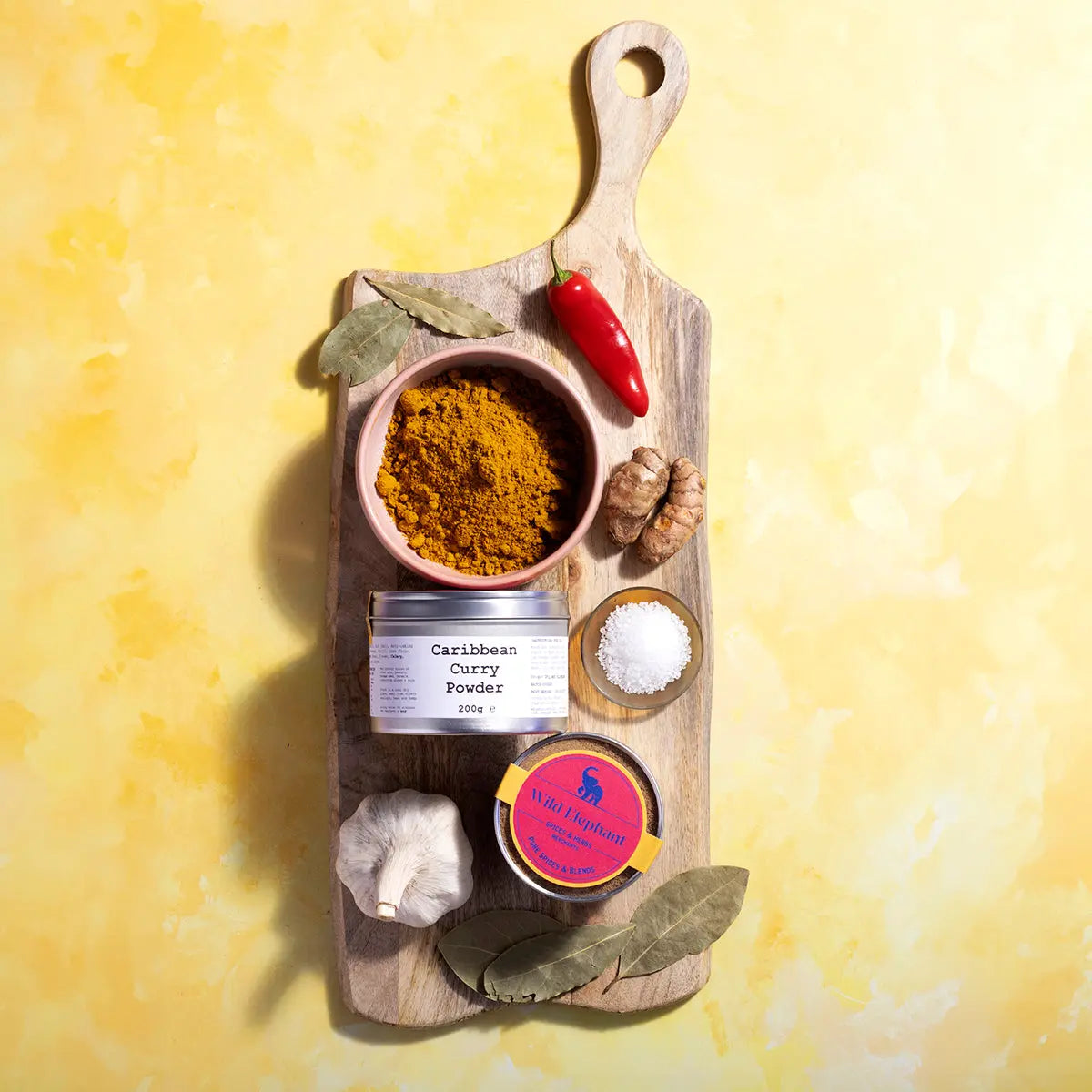 Wild Elephant Caribbean Curry Powder in a jar, aromatic spices for flavorful Caribbean dishes, from Whole Food Earth.