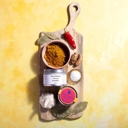 Wild Elephant Caribbean Curry Powder in a jar, aromatic spices for flavorful Caribbean dishes, from Whole Food Earth.