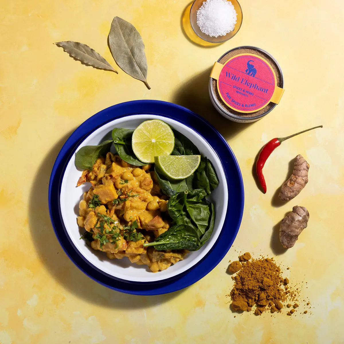 Wild Elephant Caribbean Curry Powder in a jar, vibrant yellow spice blend for flavorful Caribbean dishes, part of Whole Food Earth seasonings.