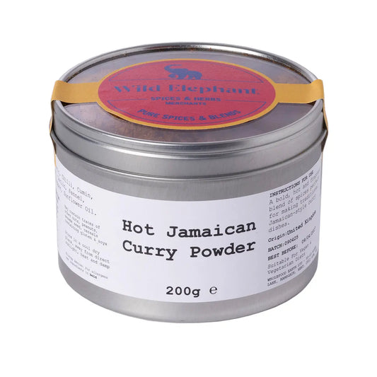 Wild Elephant hot Jamaican curry powder in a spice jar, part of Whole Food Earth's seasonings and spices collection.