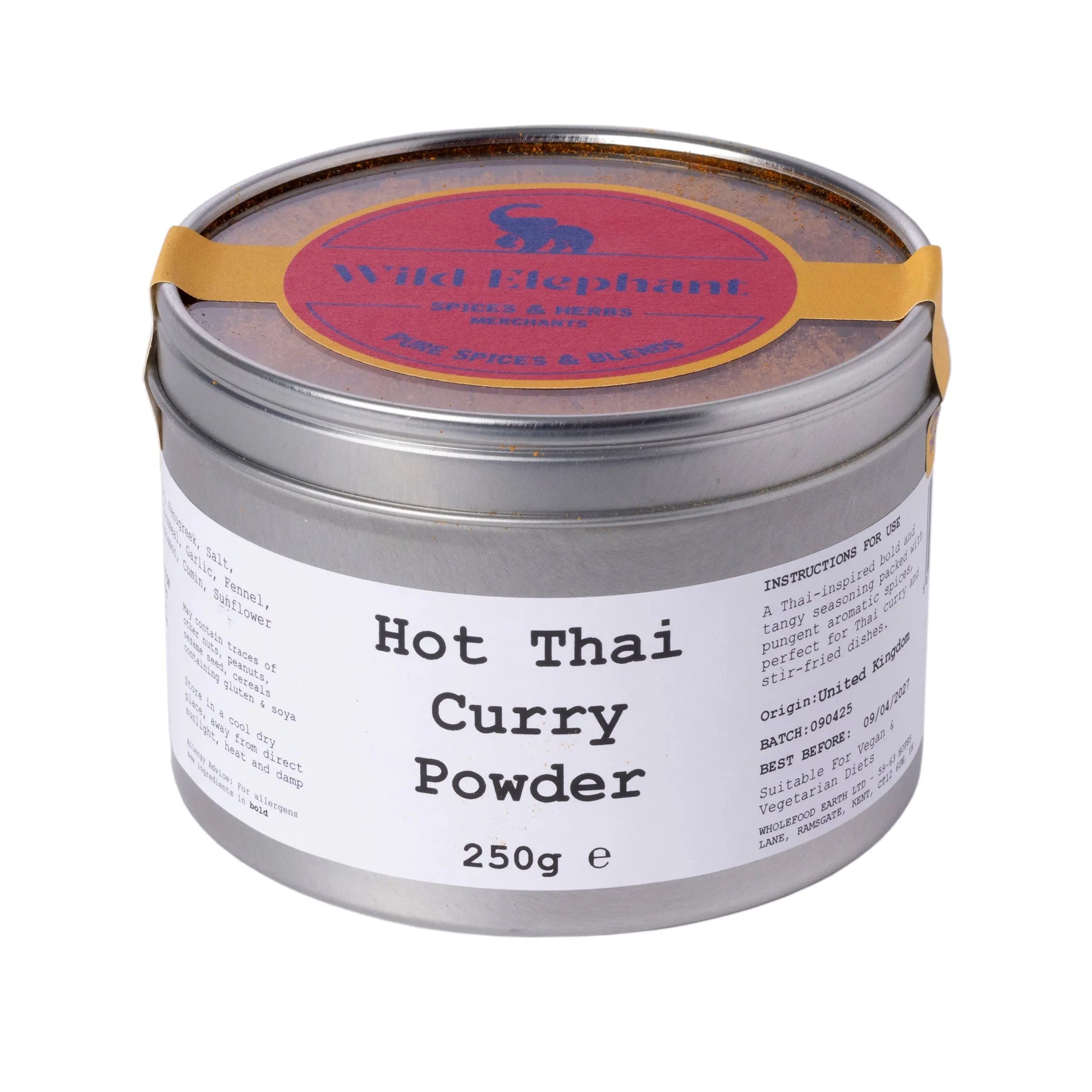 Wild Elephant Hot Thai Curry Powder from Whole Food Earth, a vibrant spice blend in a jar, ideal for flavorful Thai dishes.