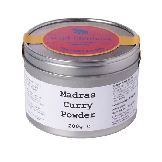 Wild Elephant Madras Curry Powder from Whole Food Earth, vibrant spice blend in a jar, perfect for flavorful Indian dishes.