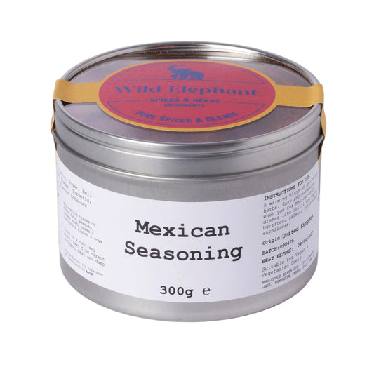 Whole Food Earth Wild Elephant Mexican Seasoning jar with colorful spice blend inside for flavorful cooking.